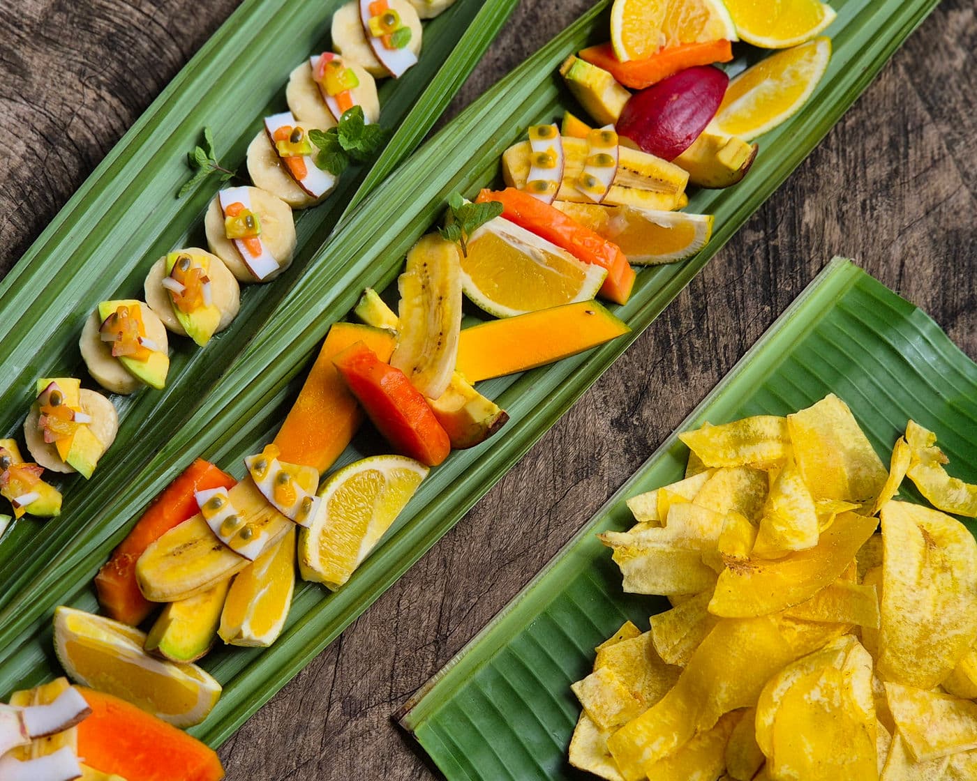 Seasonal fruit served on banana leaf